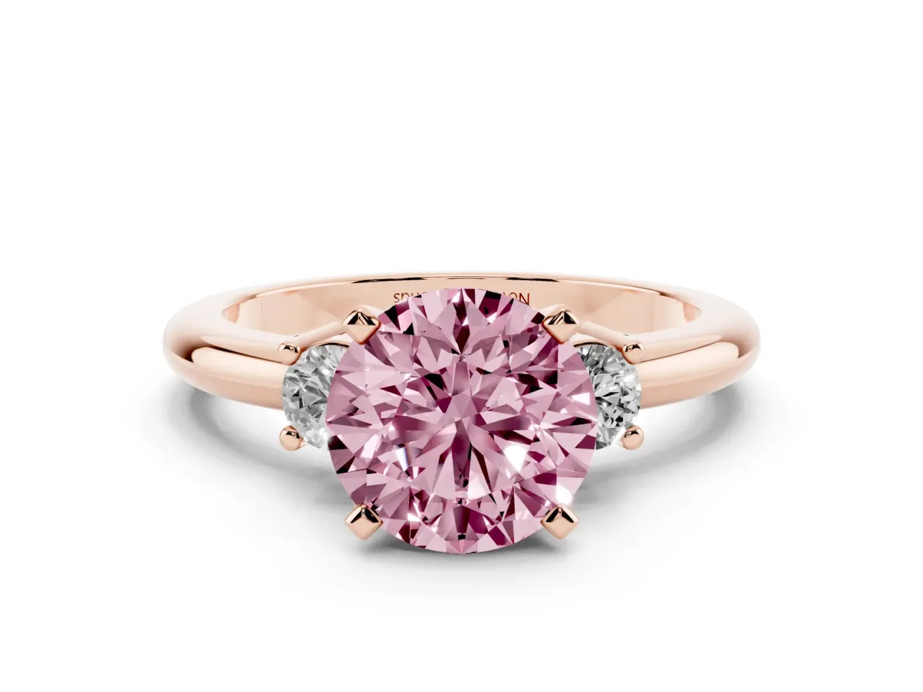 Fancy Pink Three-Stone Round Cut Diamond Ring Set in Rose gold with Prong Setting and Plain Band