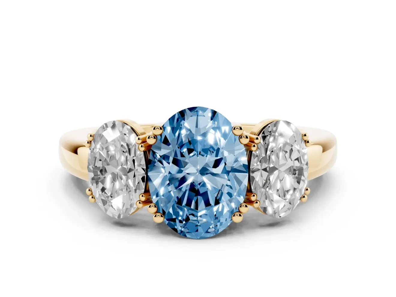Fancy Blue Oval Cut Diamond Three-Stone Ring Set in Yellow gold with Polished Band and Prong Setting