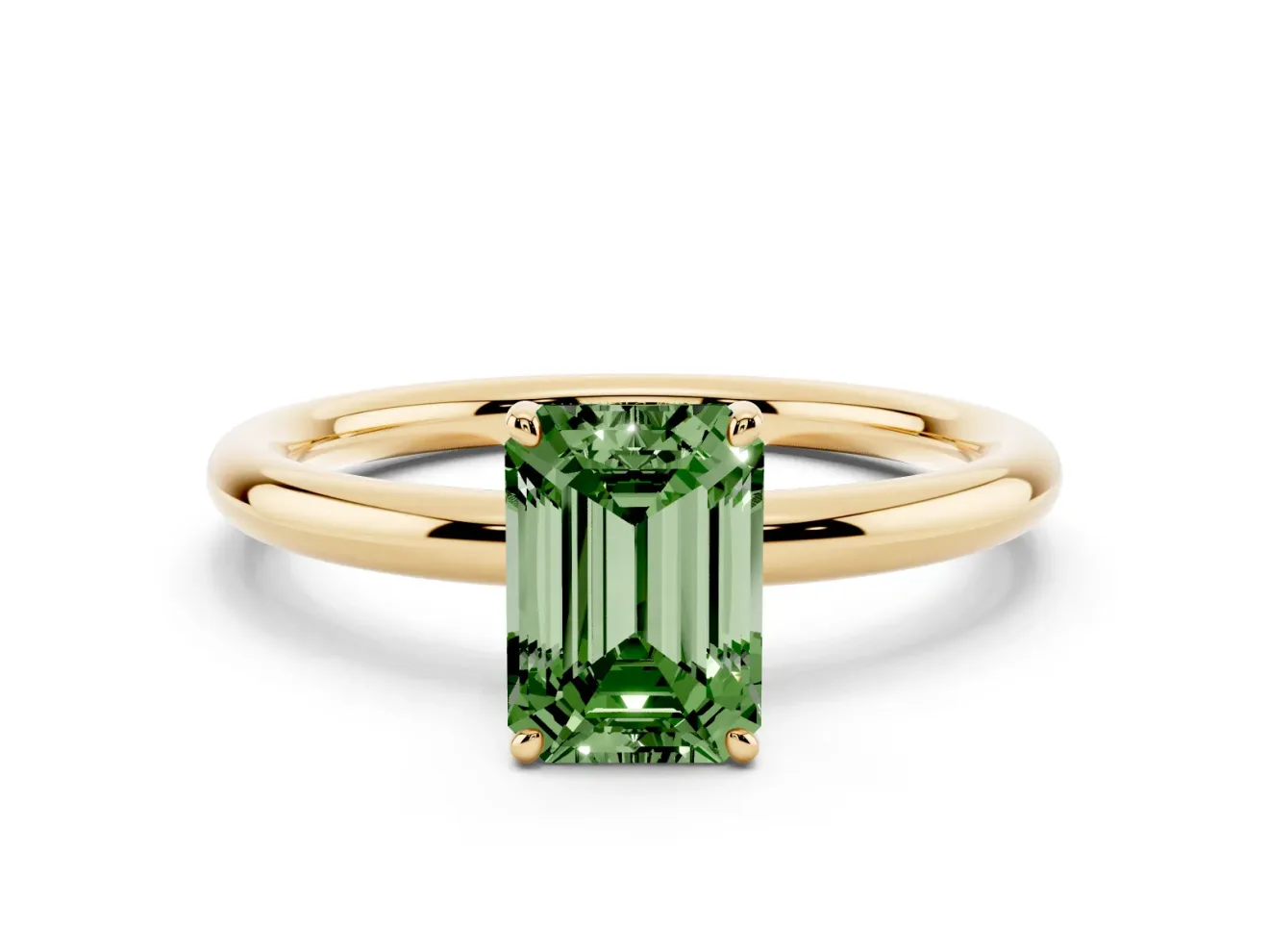 Fancy Green Emerald Cut Diamond Solitaire Ring Set in Yellow gold with Prong Setting on a Polished Plain Band