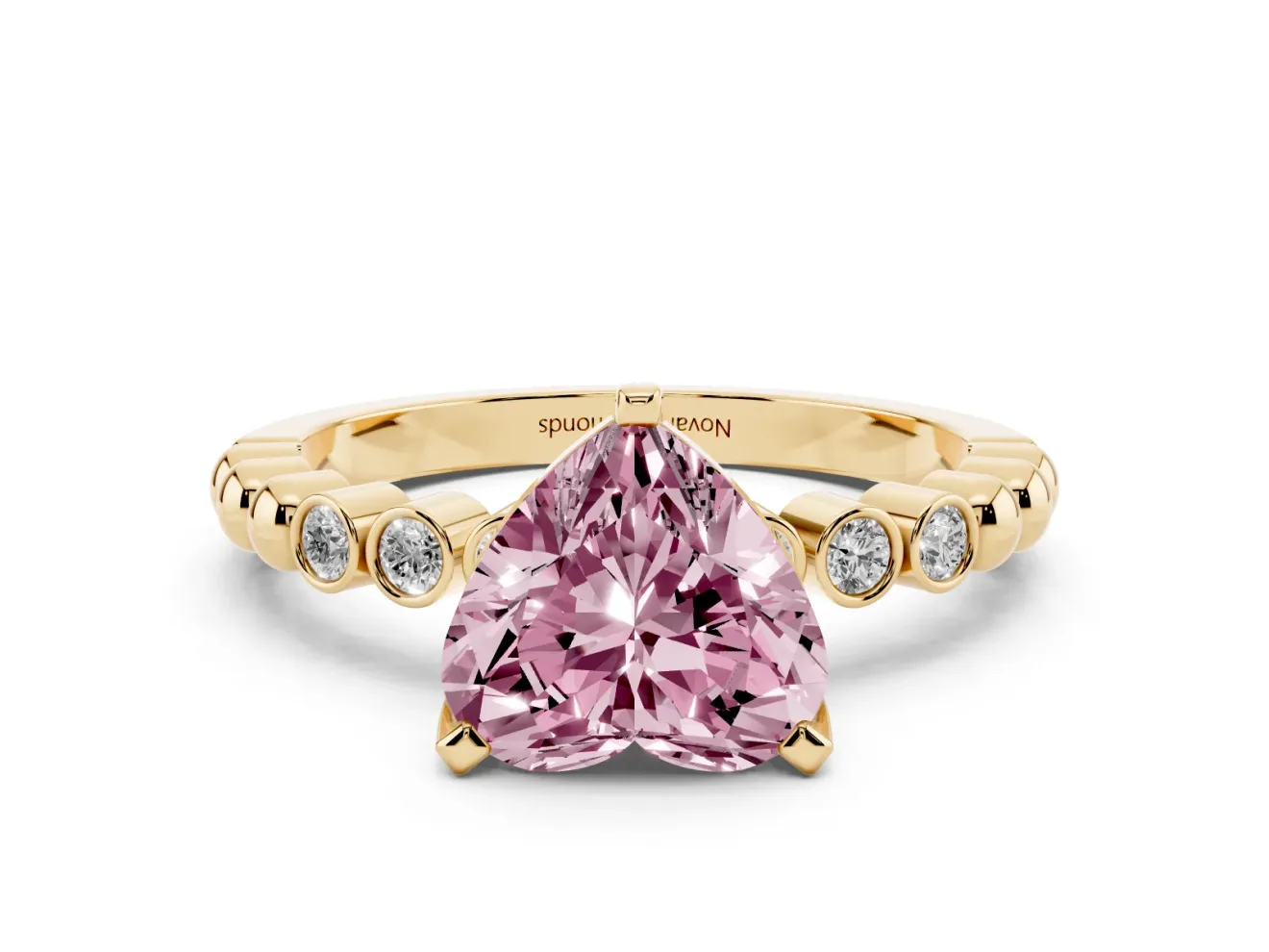 Fancy Pink Heart Cut Diamond Solitaire Engagement Ring Set in Yellow gold with Bezel Accents on Beaded Band