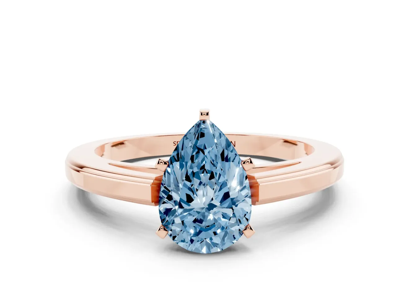 Fancy Blue Pear Cut Diamond Solitaire Ring Set in Rose gold with Prong Setting and Classic Band