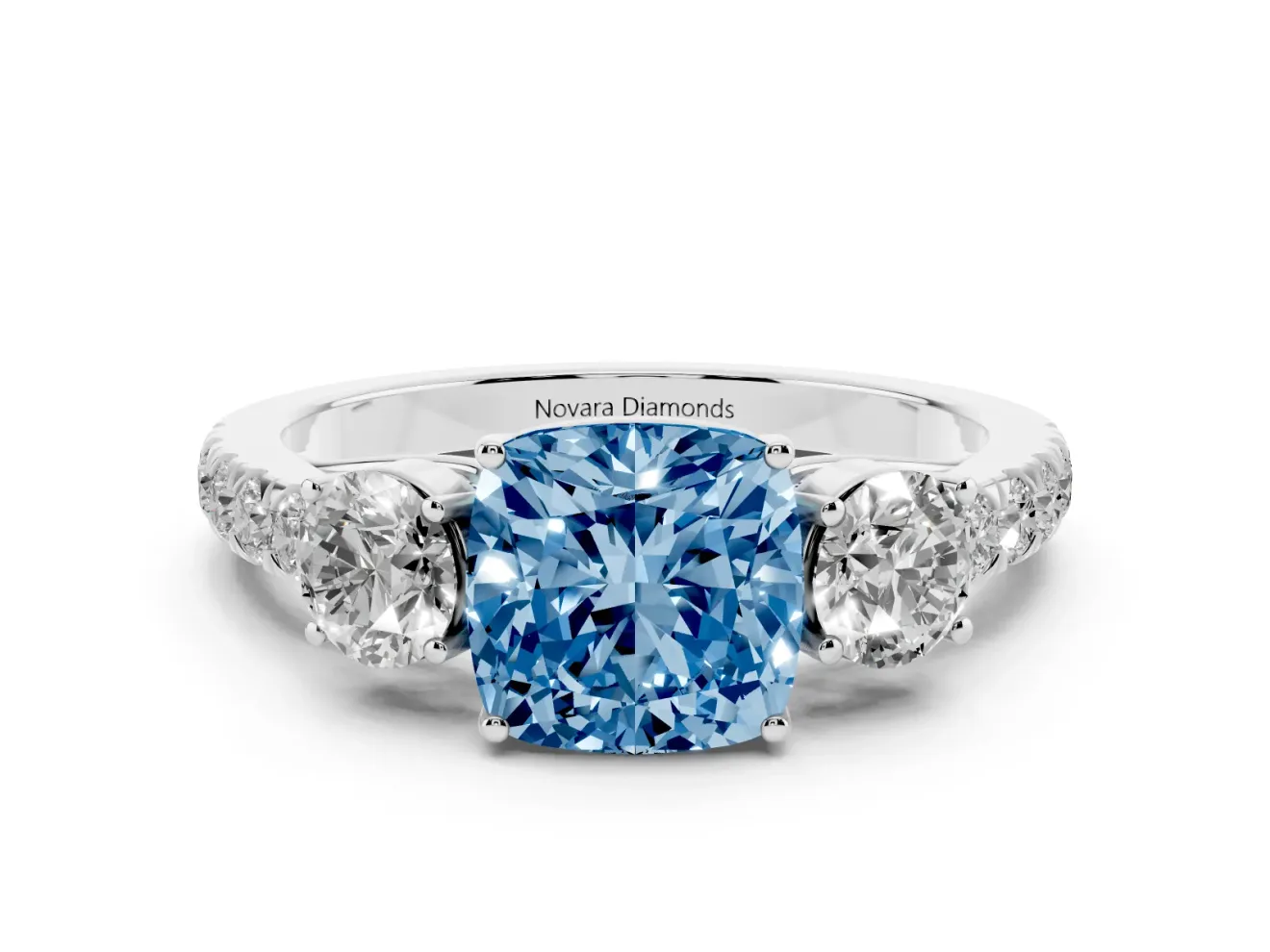 Fancy Blue Cushion Cut Diamond Three-Stone Ring Set in Silver with Round Side Stones and Delicate Pavé Band