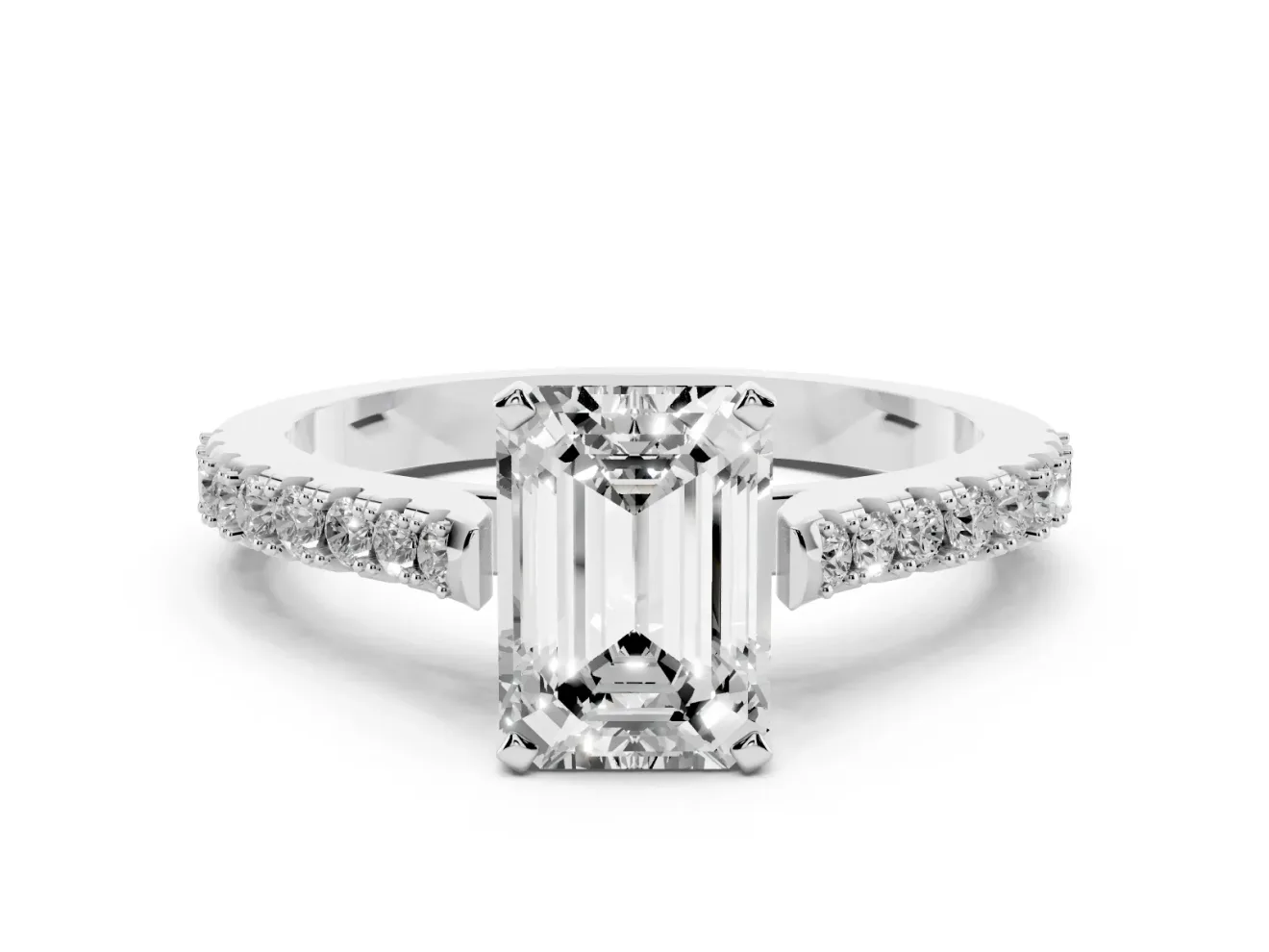 Emerald Cut Diamond Solitaire Engagement Ring Set in White gold with Delicate Pavé Band and Prong Setting