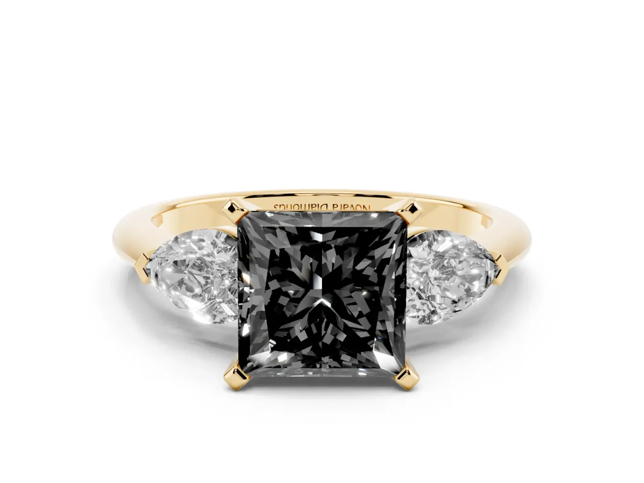Fancy Black Three-Stone Princess Cut Diamond Ring Set in Yellow gold with Pear Side Stones and Prong Setting