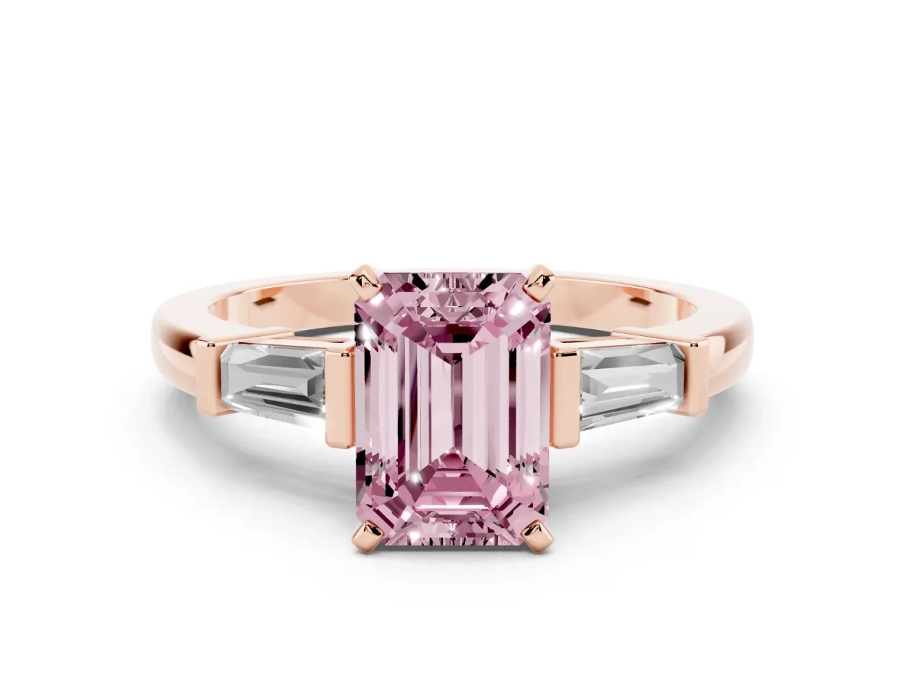 Fancy Pink Emerald Cut Diamond Solitaire Ring Set in Rose gold with Tapered Baguette Accents and Prong Setting