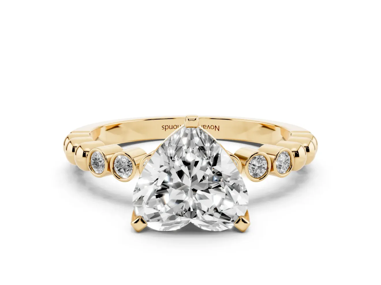 Heart Cut Diamond Solitaire Engagement Ring Set in Yellow gold with Bezel Accents on Beaded Band