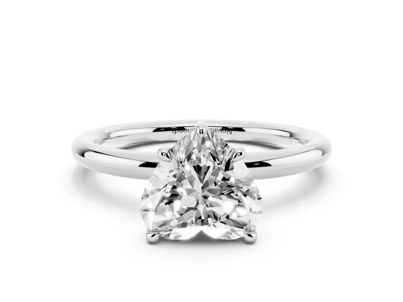 Heart Cut Diamond Solitaire Ring Set in White gold with Thin Band and Prong Setting