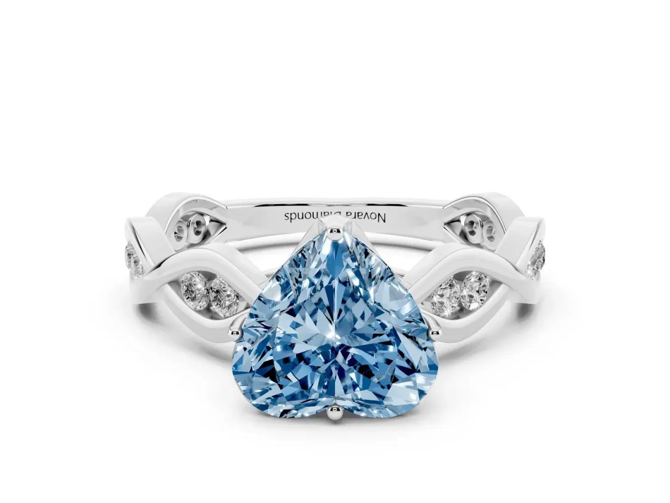 Fancy Blue Heart Cut Diamond Twist Band Solitaire Ring Set in White gold with Leaf Prong Setting and Accent Stones