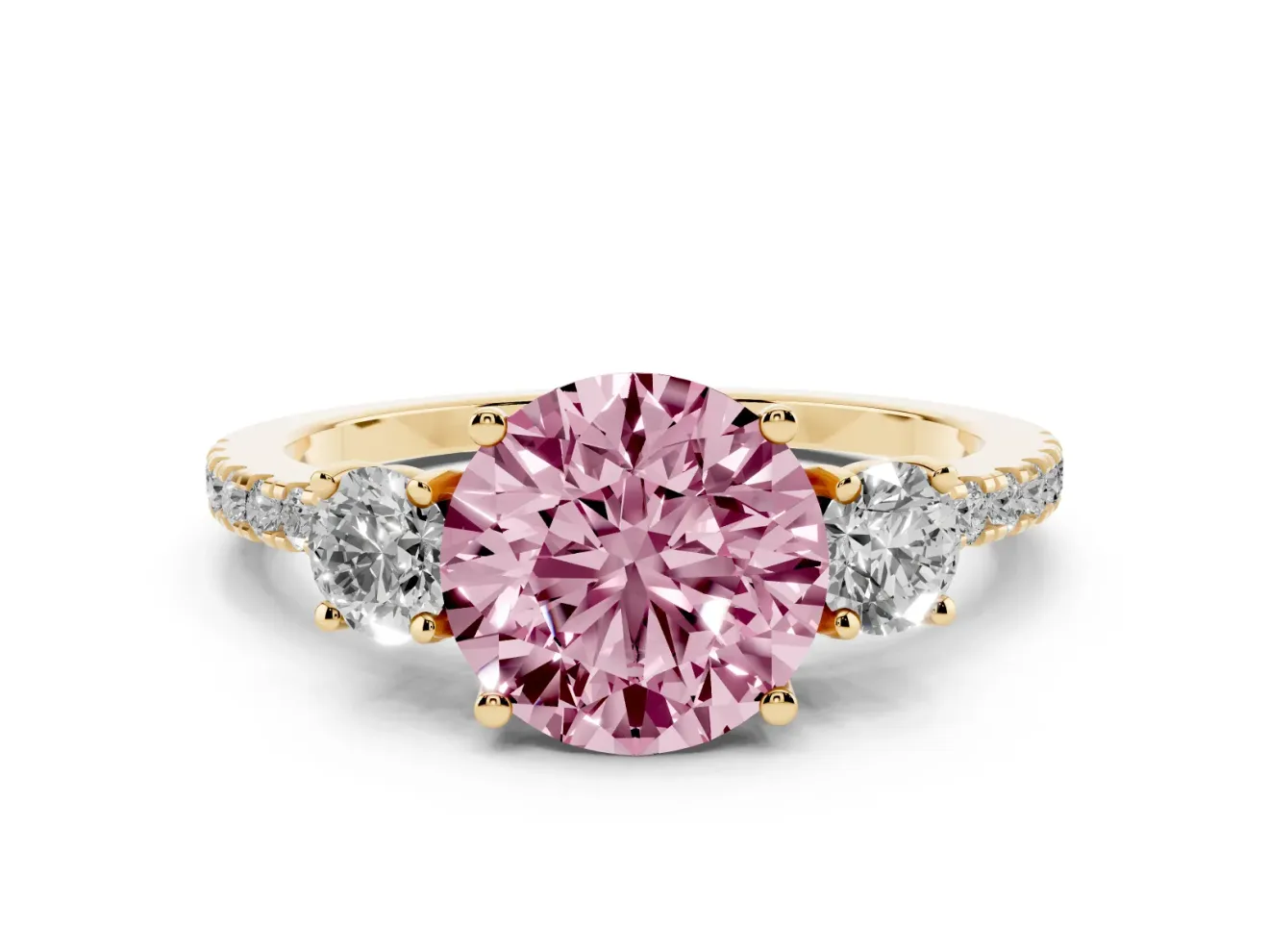 Fancy Pink Round Cut Diamond Three-Stone Ring Set in Yellow gold with Pavé Band and Graduated Sides