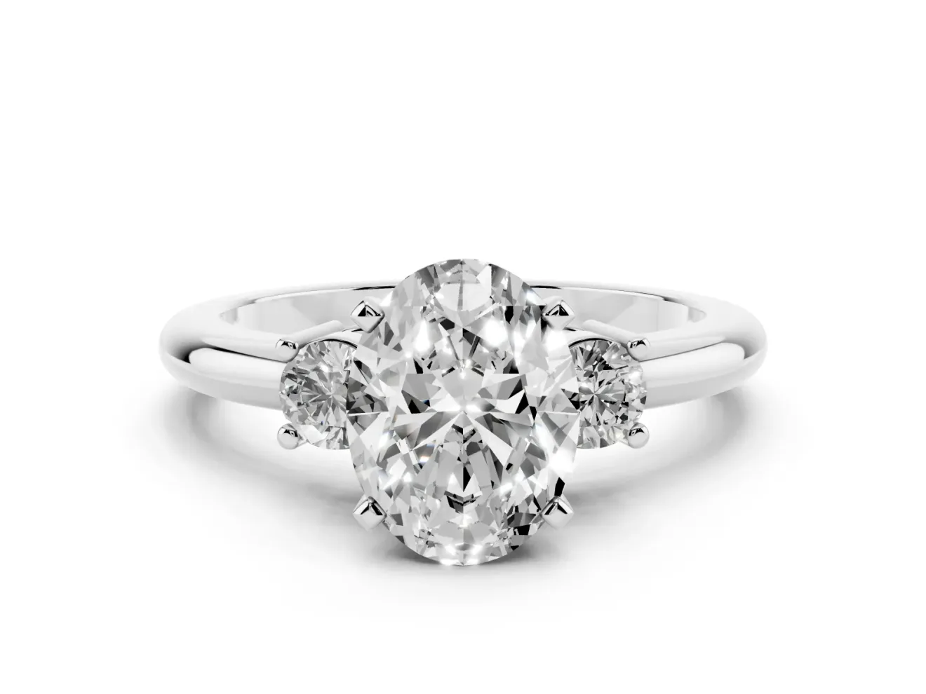 Three-Stone Oval Cut Diamond Ring Set in Platinum with Prong Setting and Plain Band