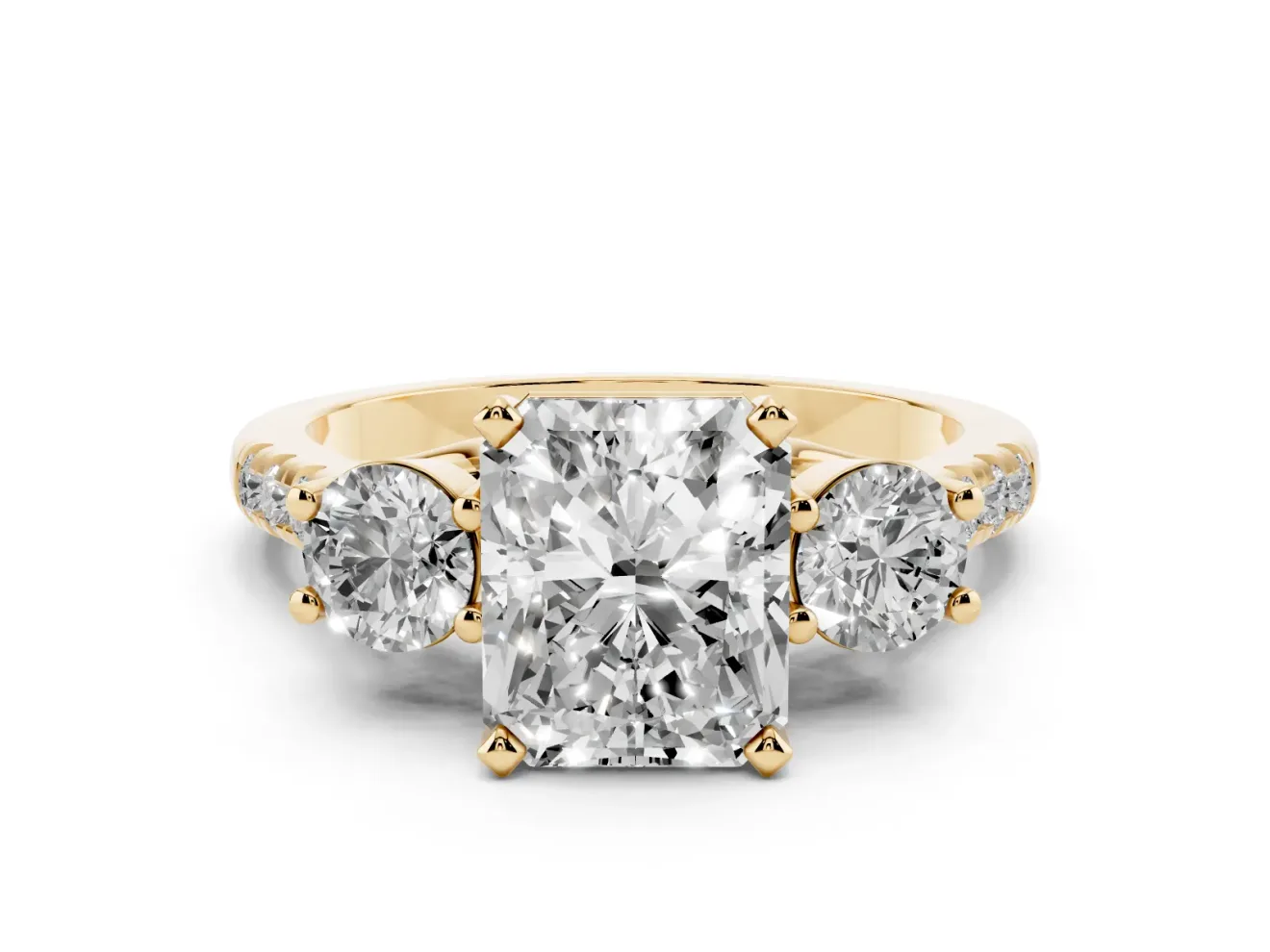 Three-Stone Radiant Cut Diamond Pavé Band Ring Set in Yellow gold with Prong-Set Trio