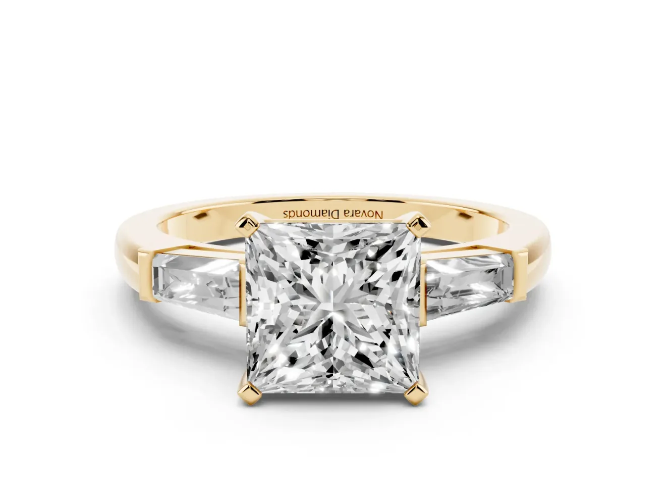 Princess Cut Diamond Solitaire Ring Set in Yellow gold with Tapered Baguette Side Stones and Prong Setting