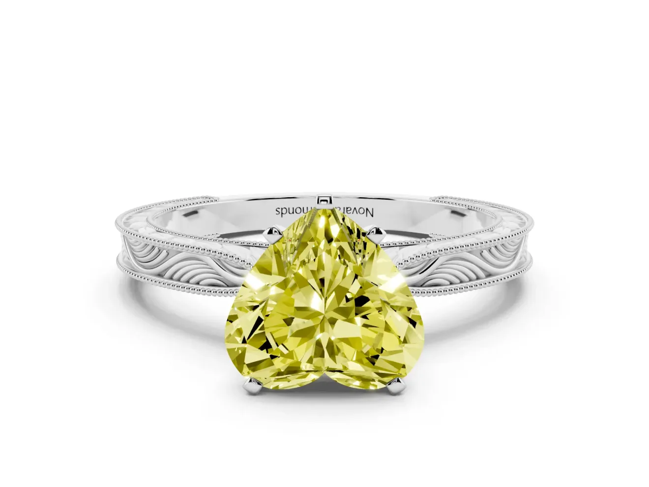Fancy Yellow Heart Cut Diamond Solitaire Milgrain Engraved Band Set in White gold with Prong Setting