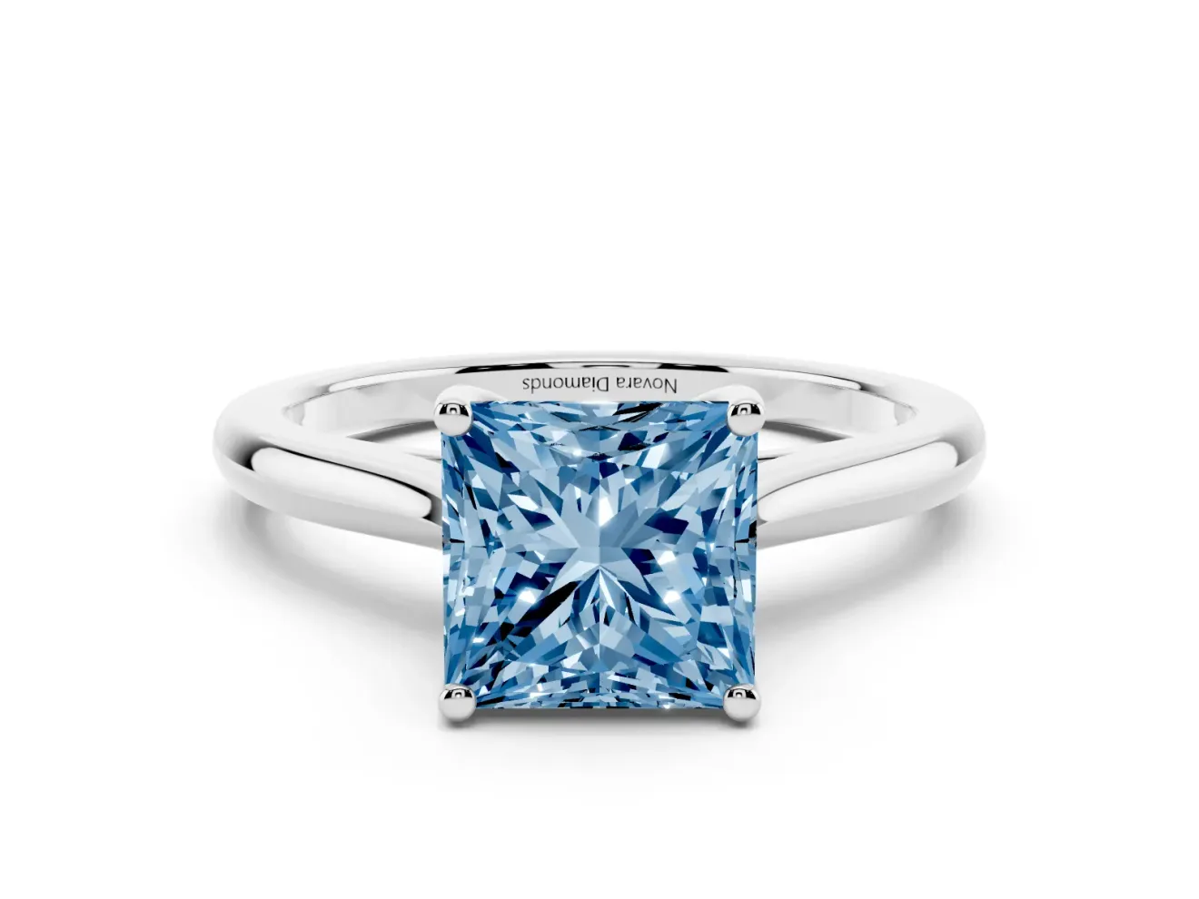 Fancy Blue Princess Cut Diamond Solitaire Ring Set in White gold with Cathedral Band and Prong Setting