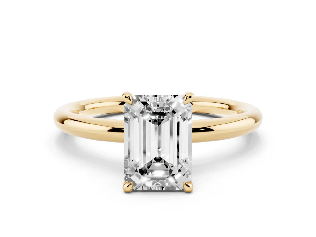 Emerald Cut Diamond Solitaire Ring Set in Yellow gold with Thin Band and Prong Setting