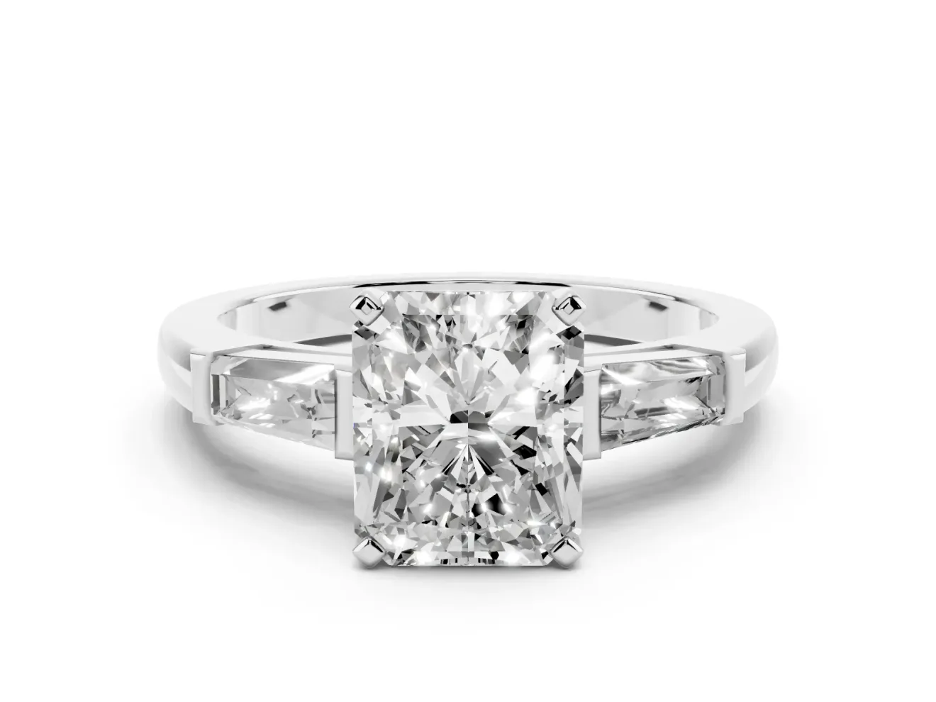 Radiant Cut Diamond Solitaire Ring Set in Platinum with Tapered Baguette Side Stones and Prong Setting