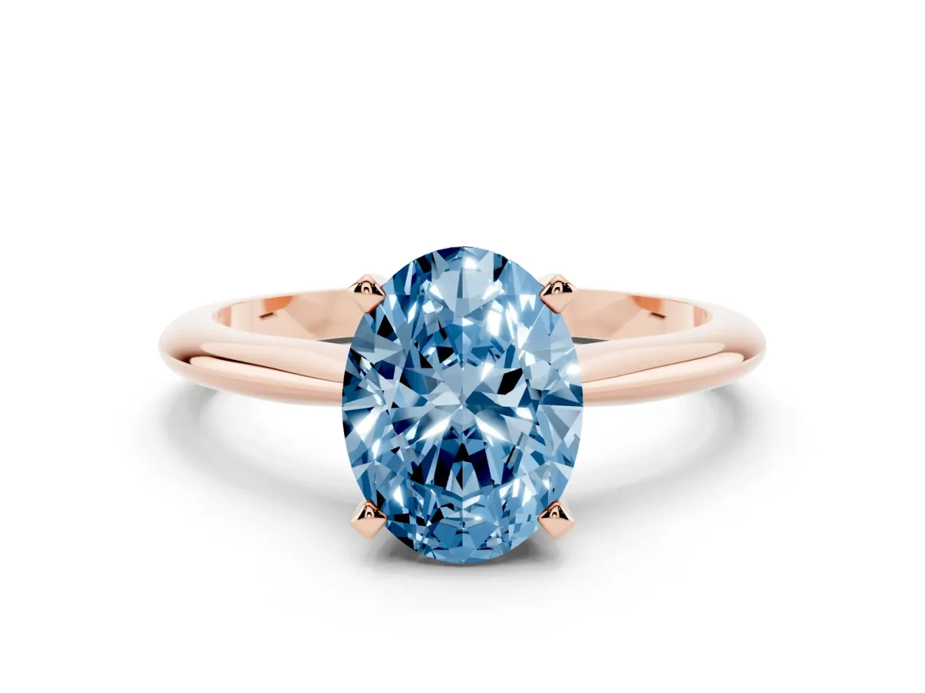 Fancy Blue Oval Cut Diamond Solitaire Ring Set in Rose gold with Prong Setting on a Plain Round Band