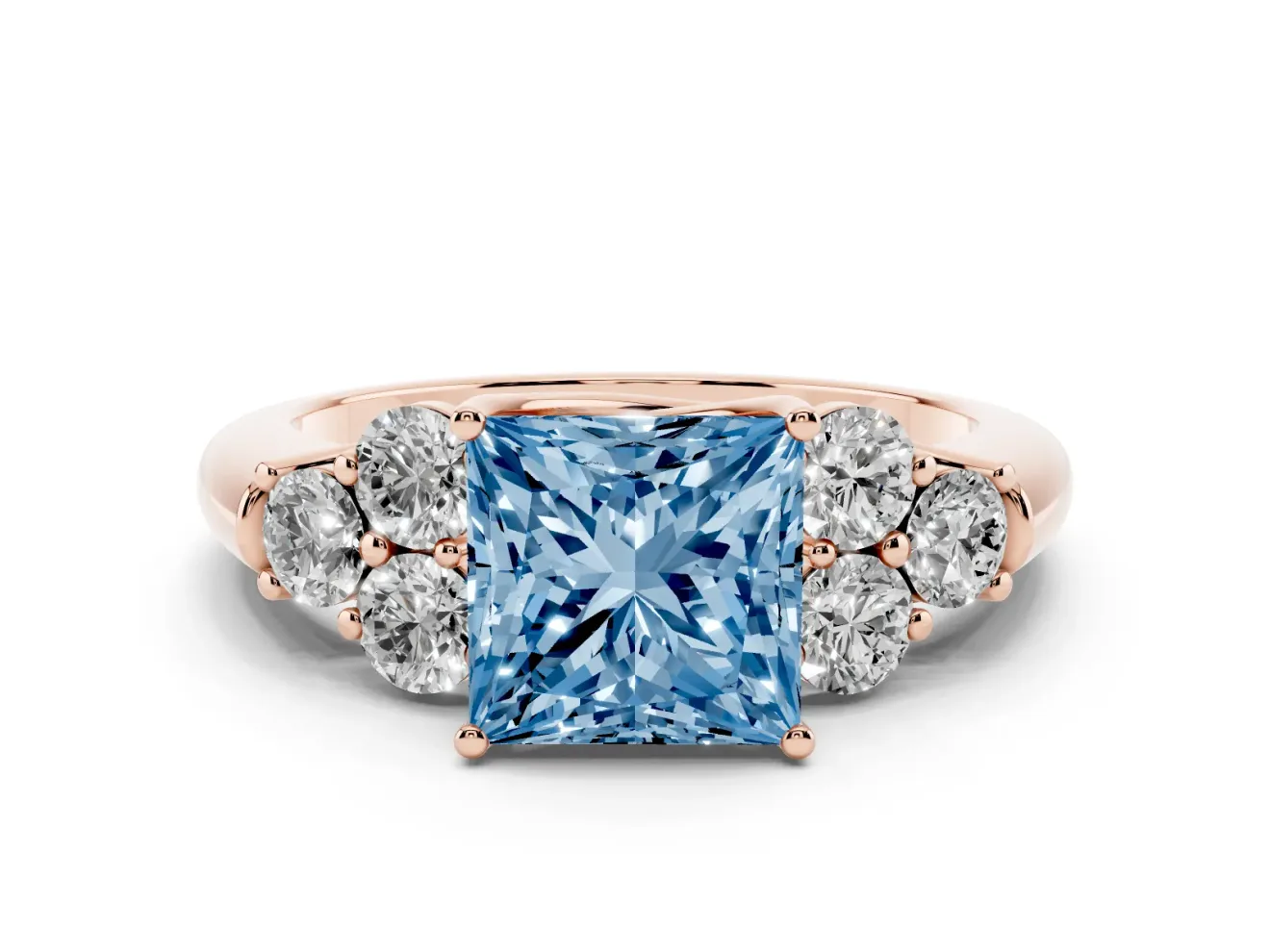 Fancy Blue Princess Cut Diamond Cluster Ring Set in Rose gold with Round Accent Stones and Prong Setting on a Plain Band