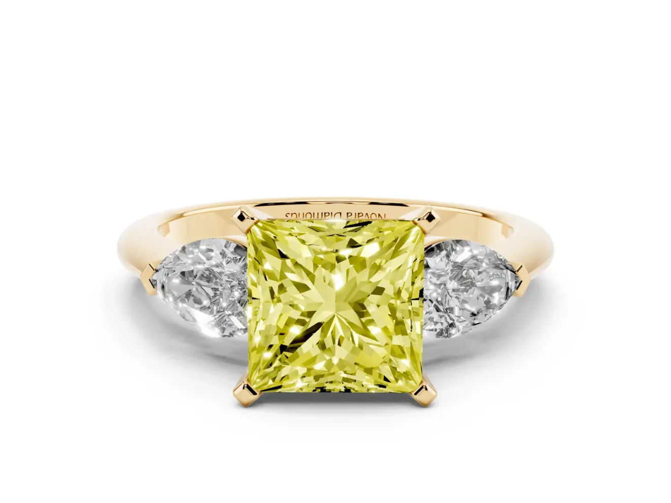 Fancy Yellow Three-Stone Princess Cut Diamond Ring Set in Yellow gold with Pear Side Stones and Prong Setting