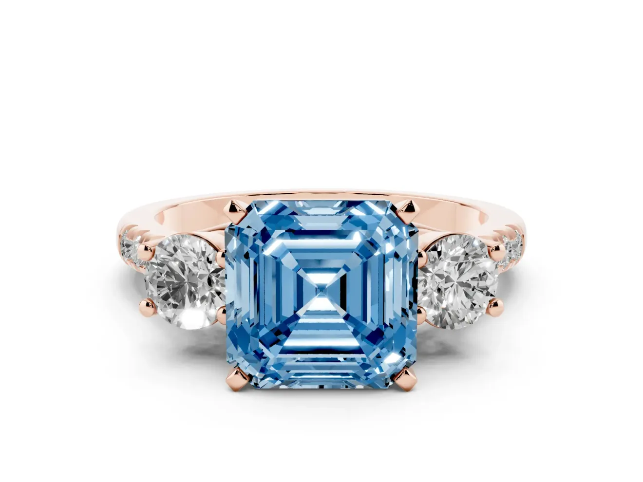 Fancy Blue Three-Stone Asscher Cut Diamond Pavé Band Ring Set in Rose gold with Prong-Set Trio