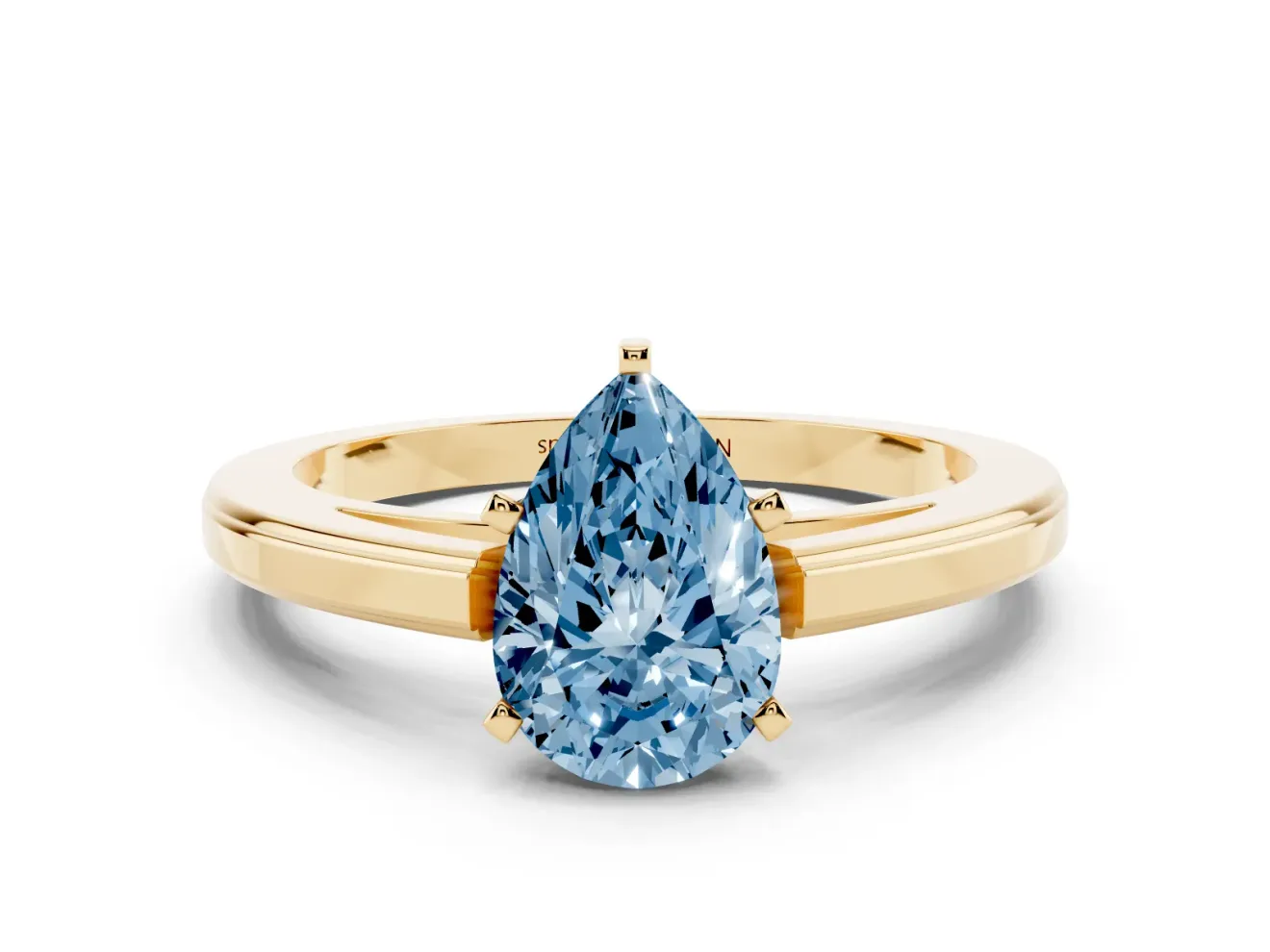 Fancy Blue Pear Cut Diamond Solitaire Ring Set in Yellow gold with Prong Setting and Classic Band