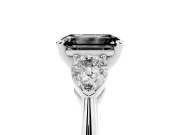 Fancy Black Three-Stone Emerald Cut Diamond Ring Set in White gold with Pear Side Stones and Prong Setting