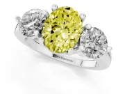 Fancy Yellow Oval Cut Diamond Three-Stone Ring Set in Silver with Prong Setting and Classic Band