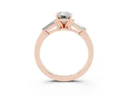 Emerald Cut Diamond Solitaire Ring Set in Rose gold with Tapered Baguette Accents and Prong Setting
