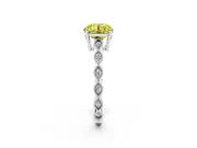 Fancy Yellow Round Cut Diamond Solitaire Ring Set in White gold with Infinity Twist Pavé Band