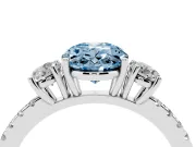 Fancy Blue Oval Cut Diamond Three-Stone Ring Set in Silver with Pavé Band and Graduated Sides