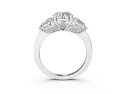 Round Cut Diamond Three-Stone Ring Set in Platinum with Pear Side Stones