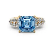 Fancy Blue Asscher Cut Diamond Cluster Engagement Ring Set in Yellow gold with Pavé Band and Prong Setting