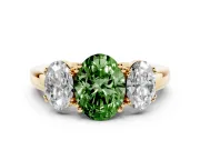 Fancy Green Oval Cut Diamond Three-Stone Ring Set in Yellow gold with Polished Band and Prong Setting