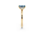 Fancy Blue Emerald Cut Diamond Solitaire Ring Set in Yellow gold with Thin Band and Prong Setting