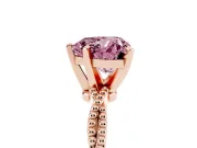 Fancy Pink Heart Cut Diamond Solitaire Ring Set in Rose gold with Twisted Band and Bead Prong Setting