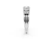 Three-Stone Cushion Cut Diamond Channel Set Ring Set in Platinum with Bar Prongs