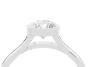 Bezel Set Pear Cut Diamond Solitaire Ring Set in Platinum with Tapered Band