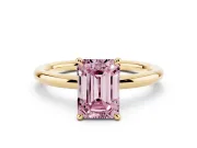 Fancy Pink Emerald Cut Diamond Solitaire Ring Set in Yellow gold with Thin Band and Prong Setting