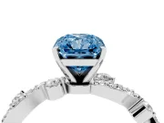 Fancy Blue Radiant Cut Diamond Solitaire Twisted Band Set in Platinum with Pavé Setting