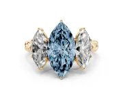 Fancy Blue Marquise Cut Diamond Three-Stone Ring Set in Yellow gold with Braided Band