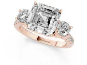 Three-Stone Asscher Cut Diamond Pavé Band Ring Set in Rose gold with Prong-Set Trio