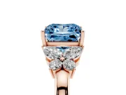 Fancy Blue Princess Cut Diamond Solitaire Floral Ring Set in Rose gold with Marquise Petals and Prong Setting