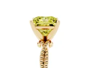 Fancy Yellow Princess Cut Diamond Solitaire Ring Set in Yellow gold with Twisted Band and Bead Prong Setting