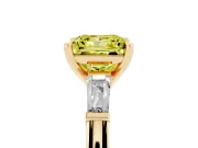 Fancy Yellow Princess Cut Diamond Solitaire Ring Set in Yellow gold with Tapered Baguette Side Stones and Prong Setting