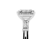 Emerald Cut Diamond Solitaire Ring Set in White gold with Tapered Baguette Side Stones and Prong Setting