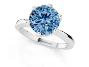 Fancy Blue Round Cut Diamond Solitaire Engagement Ring Set in White gold with Slim Tapered Solitaire Band