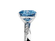 Fancy Blue Radiant Cut Diamond Engagement Ring Set in Silver with Side Stone Accents and Prong Setting