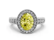 Fancy Yellow Oval Cut Diamond Halo Ring Set in Silver with Round Accent Halo, Pavé Band and Prong Setting