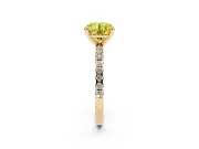 Fancy Yellow Round Cut Diamond Brilliant Solitaire Ring Set in Yellow gold with Pavé Band and Prong Setting