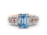 Fancy Blue Emerald Cut Diamond Cluster Engagement Ring Set in Rose gold with Pavé Band and Prong Setting